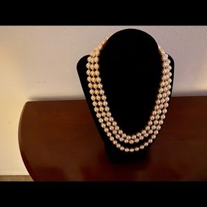 Three row elegant white pearls